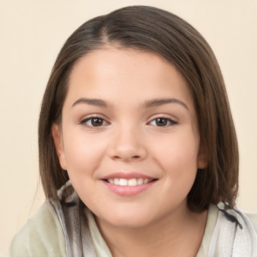 Joyful white child female with medium  brown hair and brown eyes