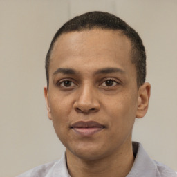 Neutral white young-adult male with short  black hair and brown eyes