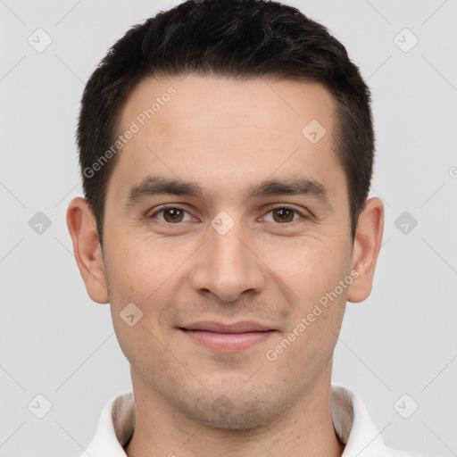 Joyful white young-adult male with short  brown hair and brown eyes