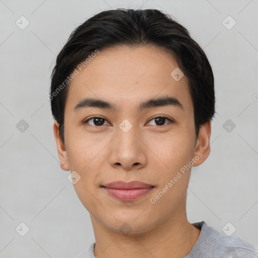 Joyful asian young-adult male with short  black hair and brown eyes