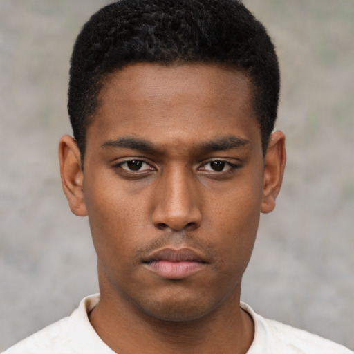 Neutral black young-adult male with short  black hair and brown eyes