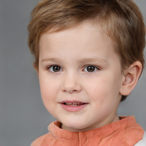 Joyful white child male with short  brown hair and brown eyes