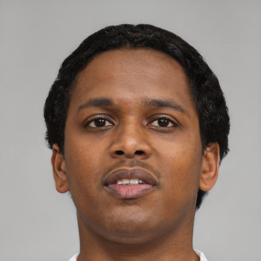 Neutral black young-adult male with short  black hair and brown eyes