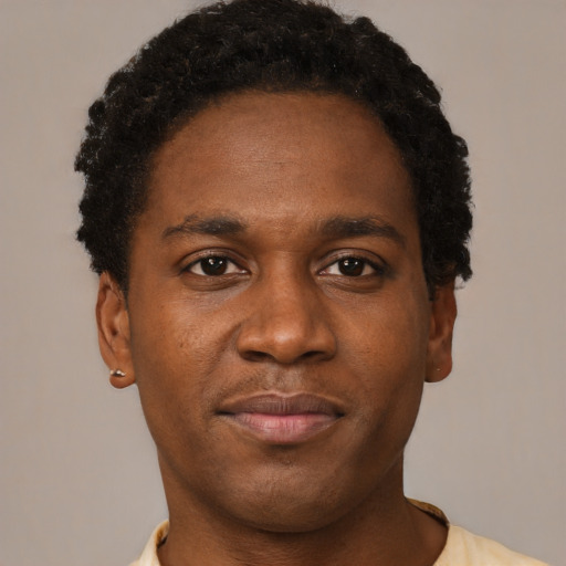Neutral black young-adult male with short  brown hair and brown eyes