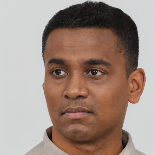 Neutral black young-adult male with short  black hair and brown eyes