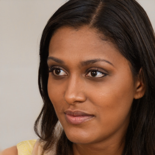 Neutral asian young-adult female with long  brown hair and brown eyes