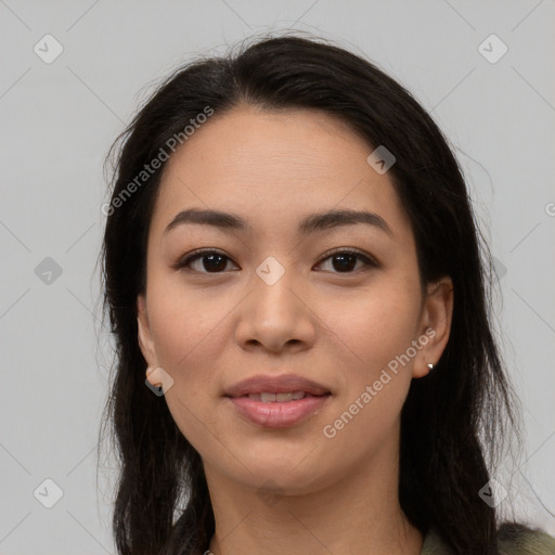 Joyful asian young-adult female with long  brown hair and brown eyes