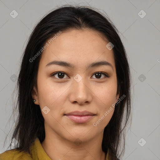 Joyful latino young-adult female with long  brown hair and brown eyes