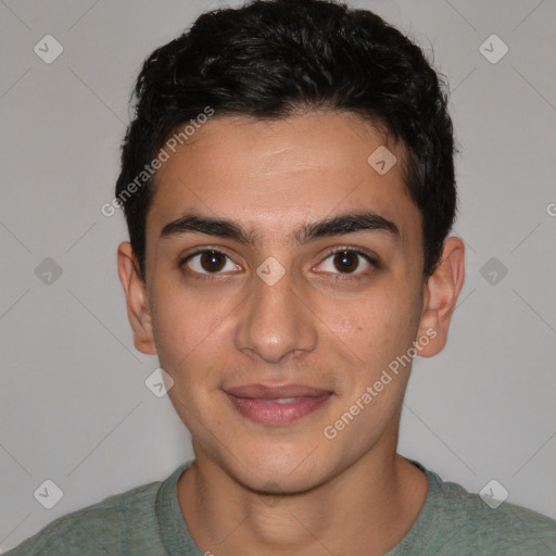 Joyful white young-adult male with short  black hair and brown eyes