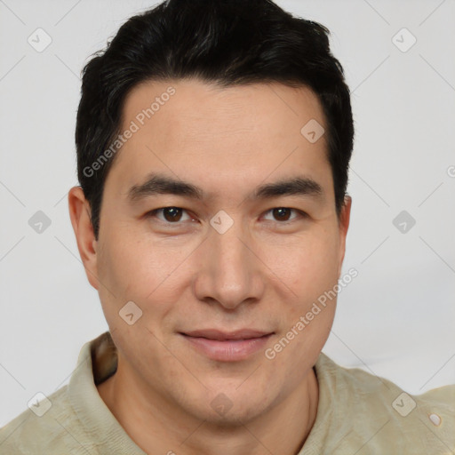 Joyful latino young-adult male with short  brown hair and brown eyes