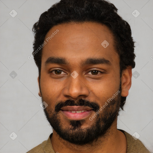 Neutral black young-adult male with short  black hair and brown eyes