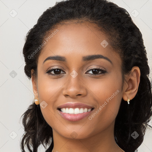 Joyful latino young-adult female with long  brown hair and brown eyes