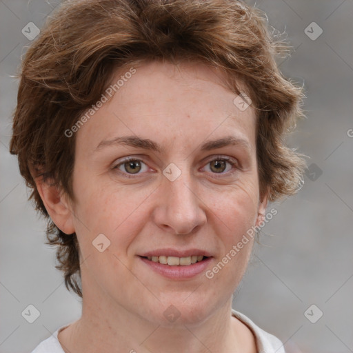 Joyful white adult female with short  brown hair and grey eyes