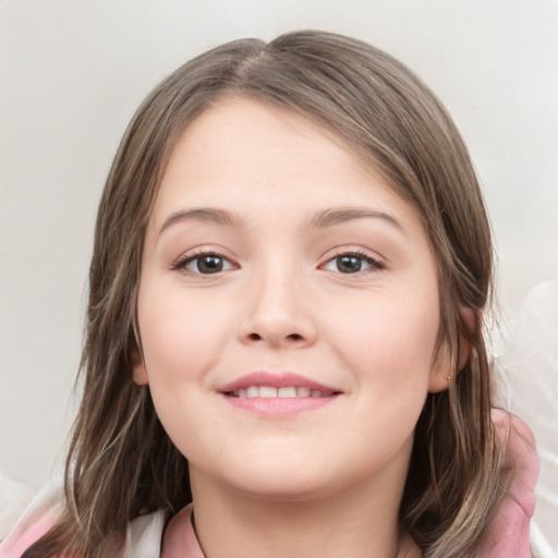 Joyful white child female with medium  brown hair and grey eyes