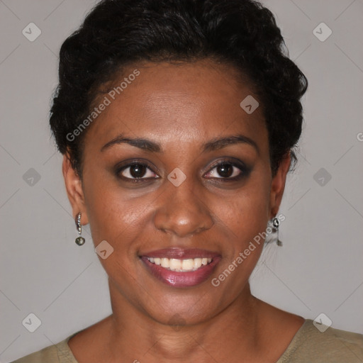 Joyful black young-adult female with short  black hair and brown eyes