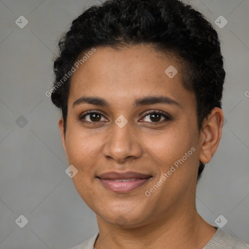 Joyful latino young-adult female with short  brown hair and brown eyes