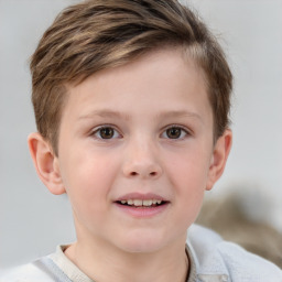 Joyful white child male with short  brown hair and brown eyes