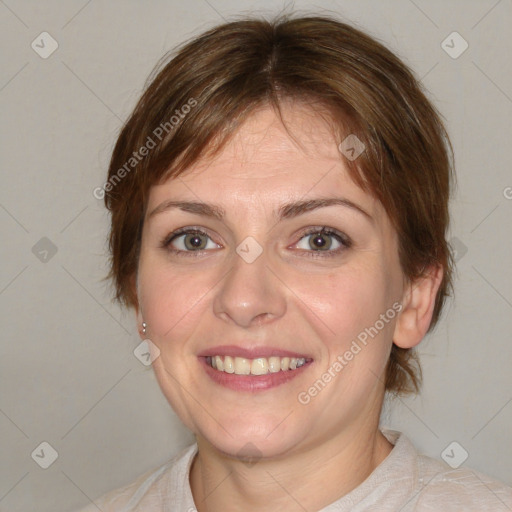 Joyful white adult female with medium  brown hair and blue eyes