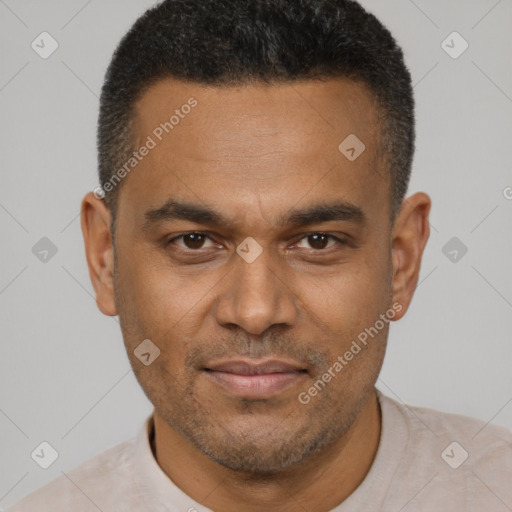 Joyful latino young-adult male with short  brown hair and brown eyes