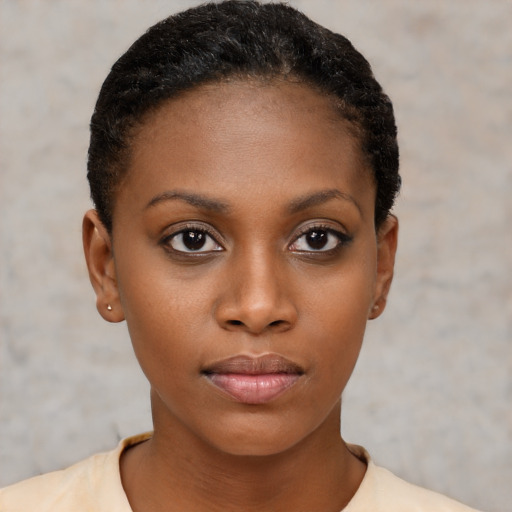 Neutral black young-adult female with short  brown hair and brown eyes