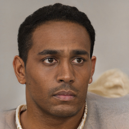 Neutral black young-adult male with short  black hair and brown eyes