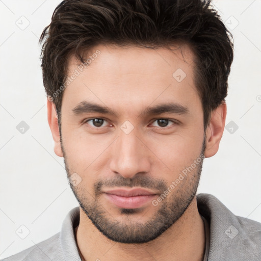 Neutral white young-adult male with short  brown hair and brown eyes