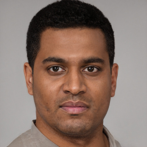 Neutral black young-adult male with short  brown hair and brown eyes