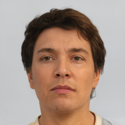 Neutral white adult male with short  brown hair and brown eyes