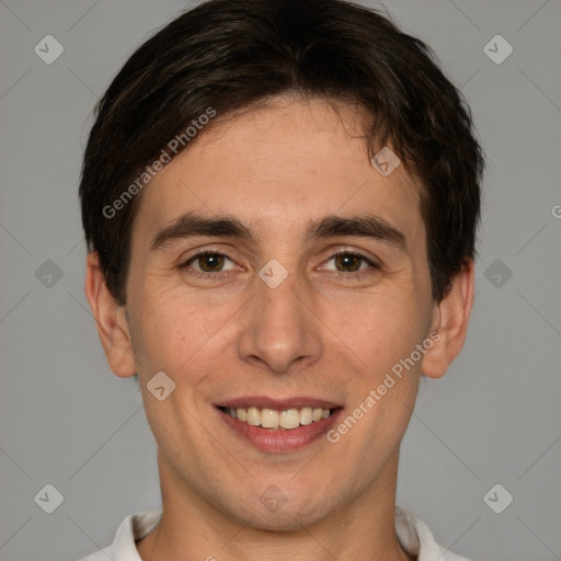 Joyful white young-adult male with short  brown hair and brown eyes