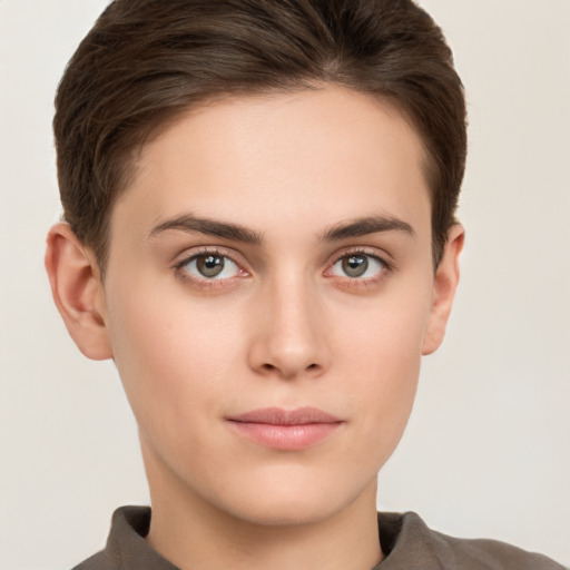 Neutral white young-adult female with short  brown hair and brown eyes