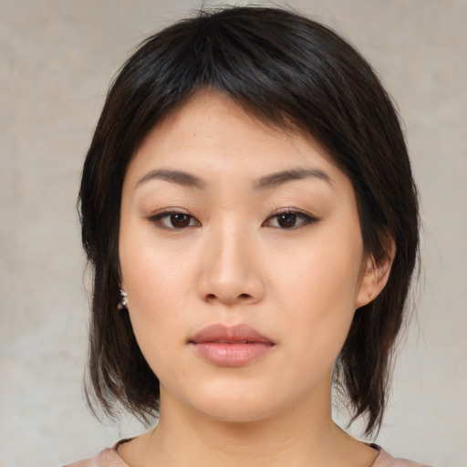 Neutral asian young-adult female with medium  brown hair and brown eyes