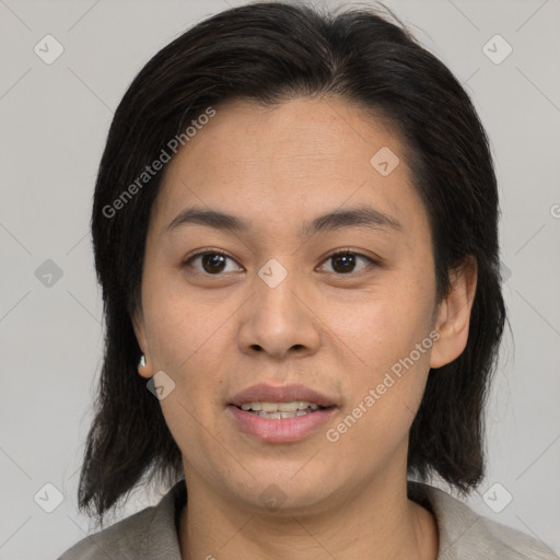 Joyful asian young-adult female with medium  brown hair and brown eyes