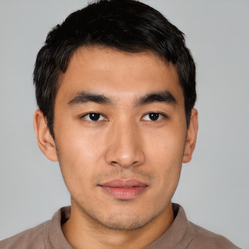 Neutral asian young-adult male with short  black hair and brown eyes