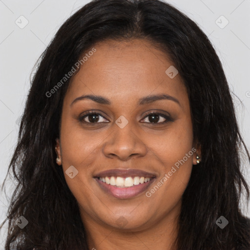 Joyful black young-adult female with long  brown hair and brown eyes