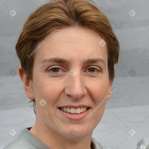 Joyful white adult female with short  brown hair and grey eyes