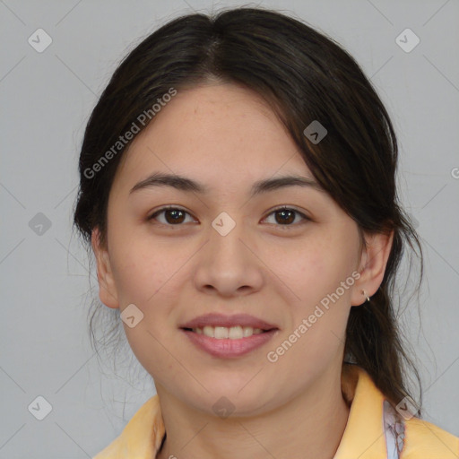 Joyful latino young-adult female with medium  brown hair and brown eyes