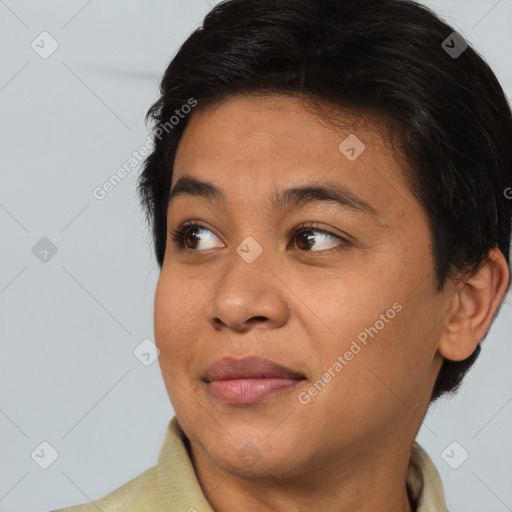 Joyful asian young-adult female with short  brown hair and brown eyes