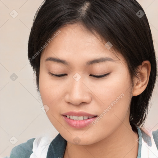 Joyful asian young-adult female with medium  brown hair and brown eyes