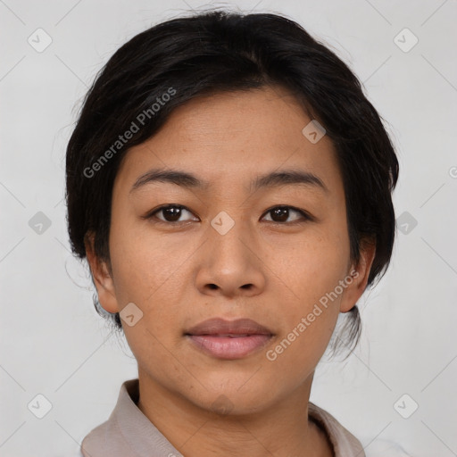 Joyful asian young-adult female with short  black hair and brown eyes