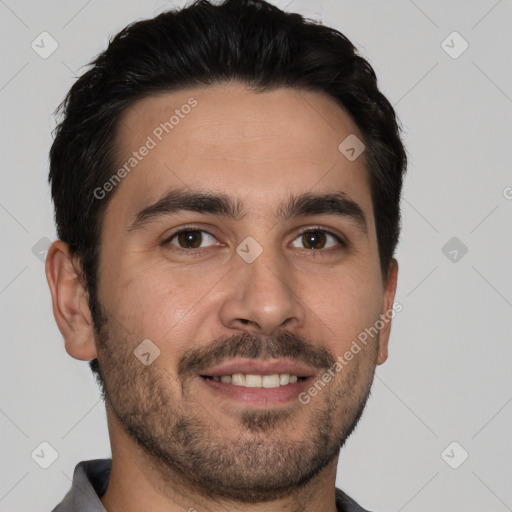 Joyful white young-adult male with short  black hair and brown eyes