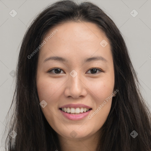 Joyful asian young-adult female with long  brown hair and brown eyes