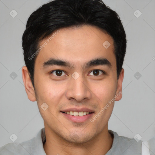 Joyful latino young-adult male with short  brown hair and brown eyes