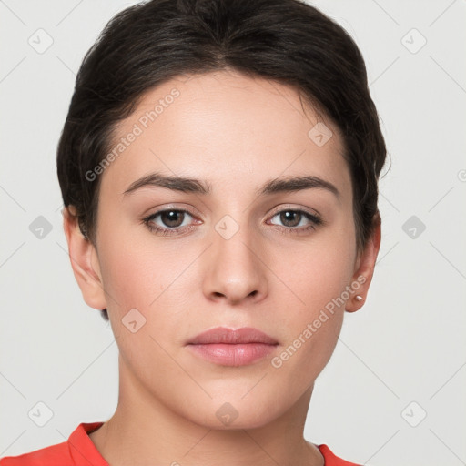 Neutral white young-adult female with short  brown hair and brown eyes