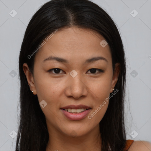 Joyful latino young-adult female with long  brown hair and brown eyes