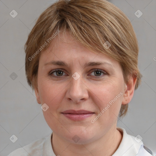 Joyful white adult female with medium  brown hair and grey eyes