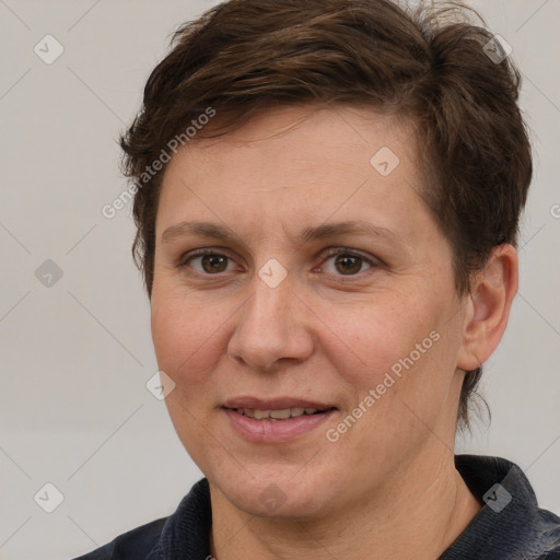 Joyful white adult female with short  brown hair and brown eyes