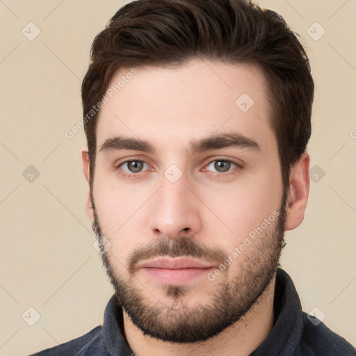 Neutral white young-adult male with short  brown hair and brown eyes