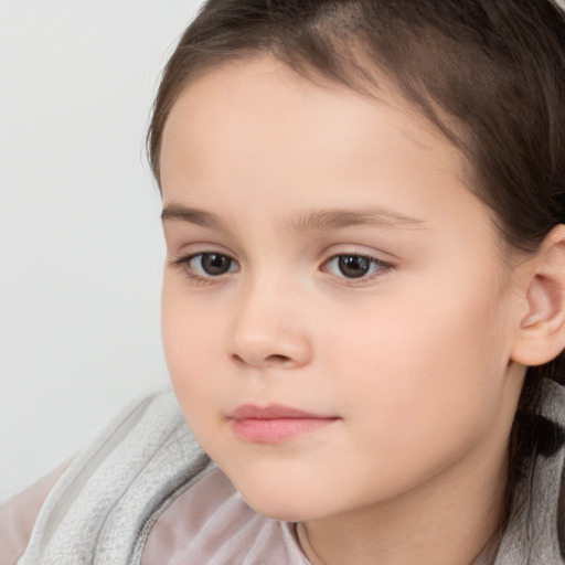 Neutral white child female with medium  brown hair and brown eyes