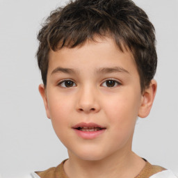 Joyful white child male with short  brown hair and brown eyes