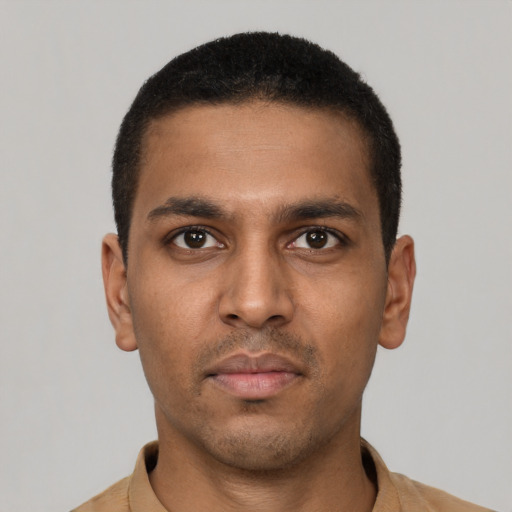Neutral latino young-adult male with short  black hair and brown eyes